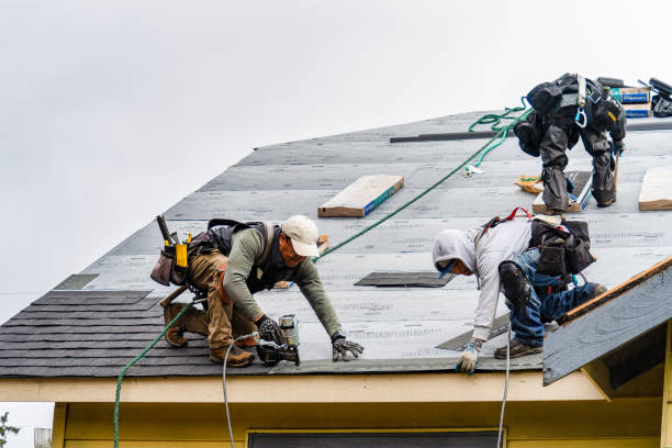 Professional Roof Replacement technician working in Hinckley, OH